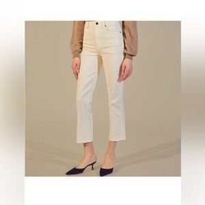 KHAITE Benny Mid Rise Kick Flare Jeans Cream Off White 24